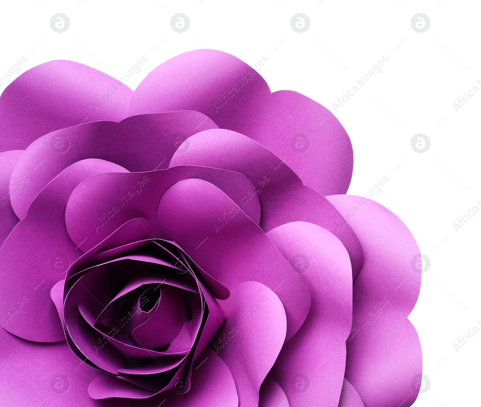 Photo of Beautiful purple flower made of paper on white background, top view