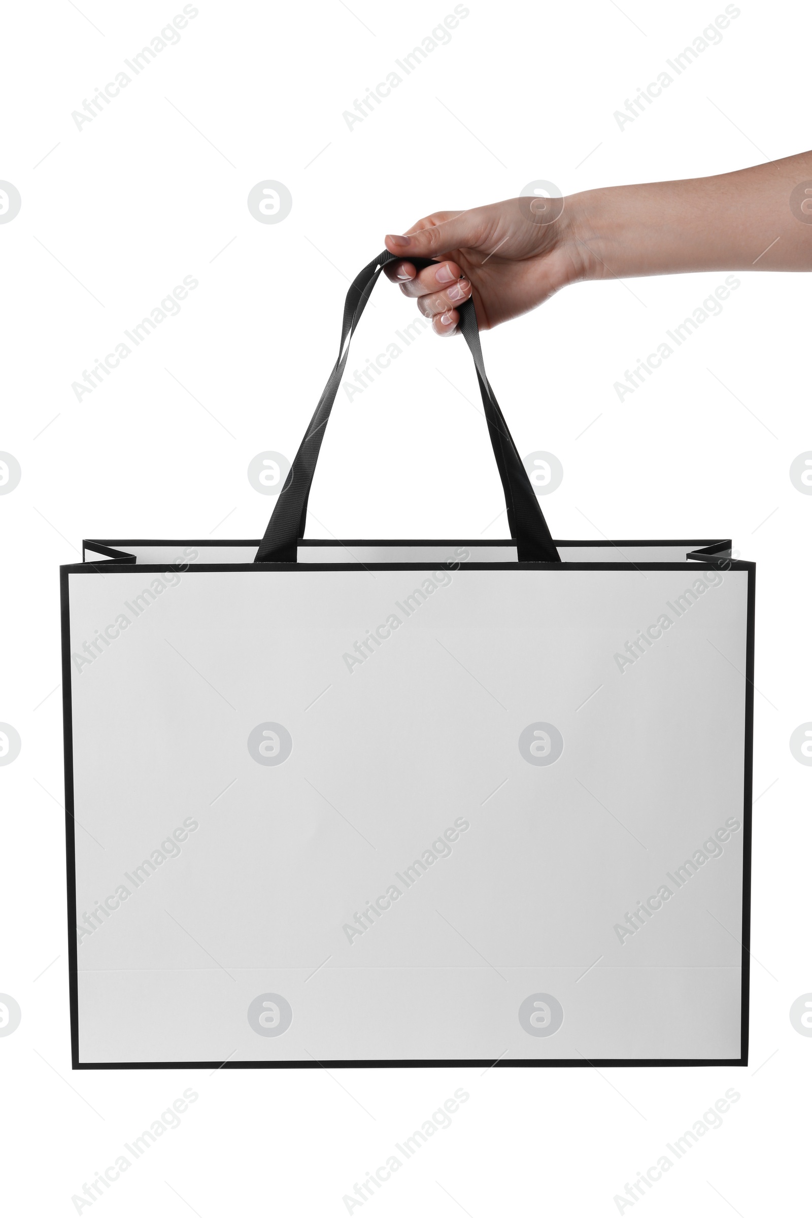 Photo of Woman holding paper bag on white background, closeup. Mockup for design
