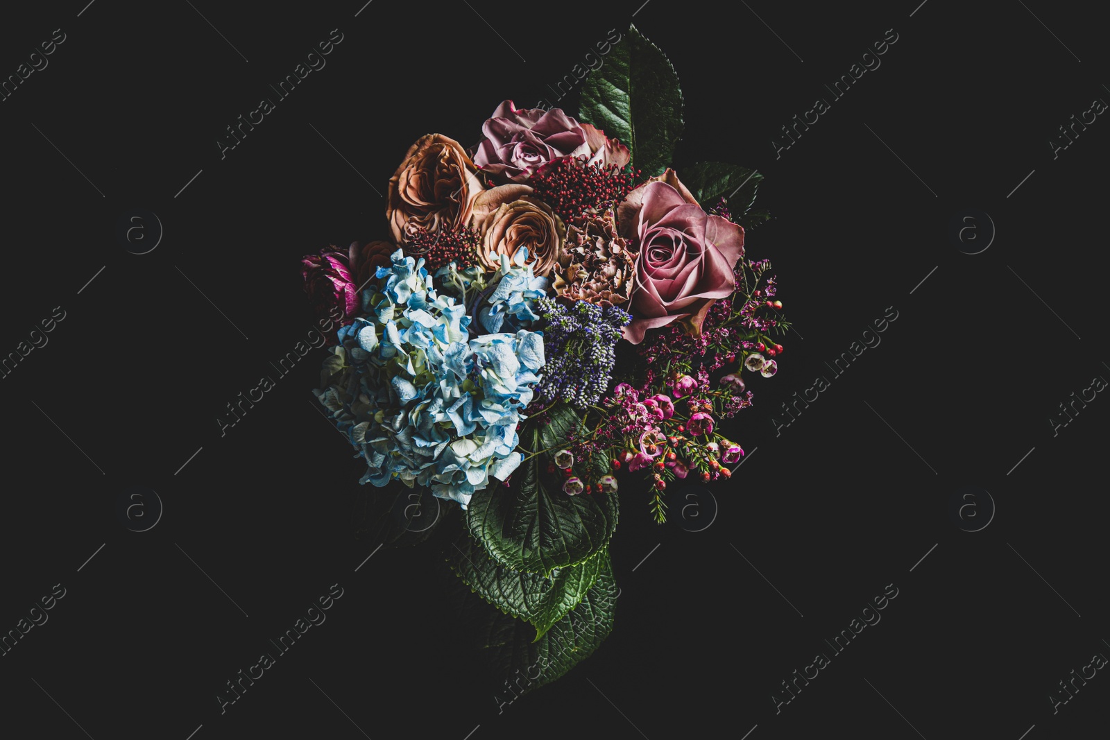 Photo of Beautiful bouquet of different flowers on black background. Floral card design with dark vintage effect