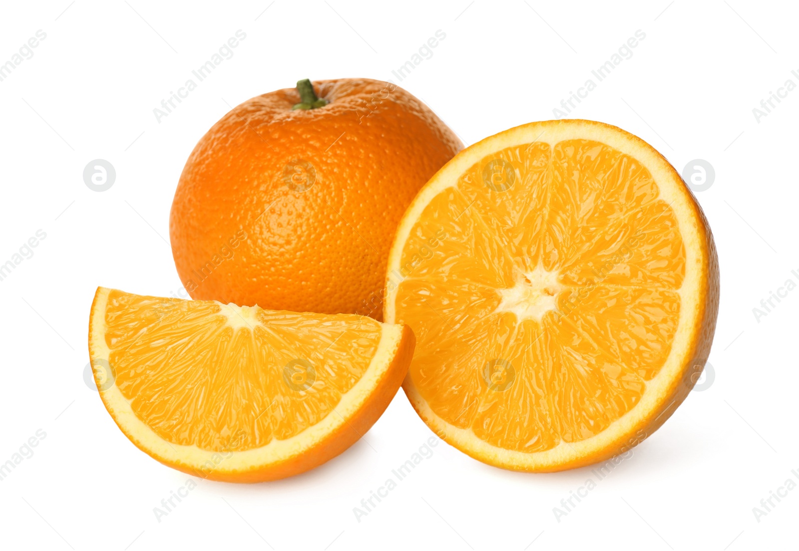 Photo of Delicious cut and whole fresh ripe oranges on white background