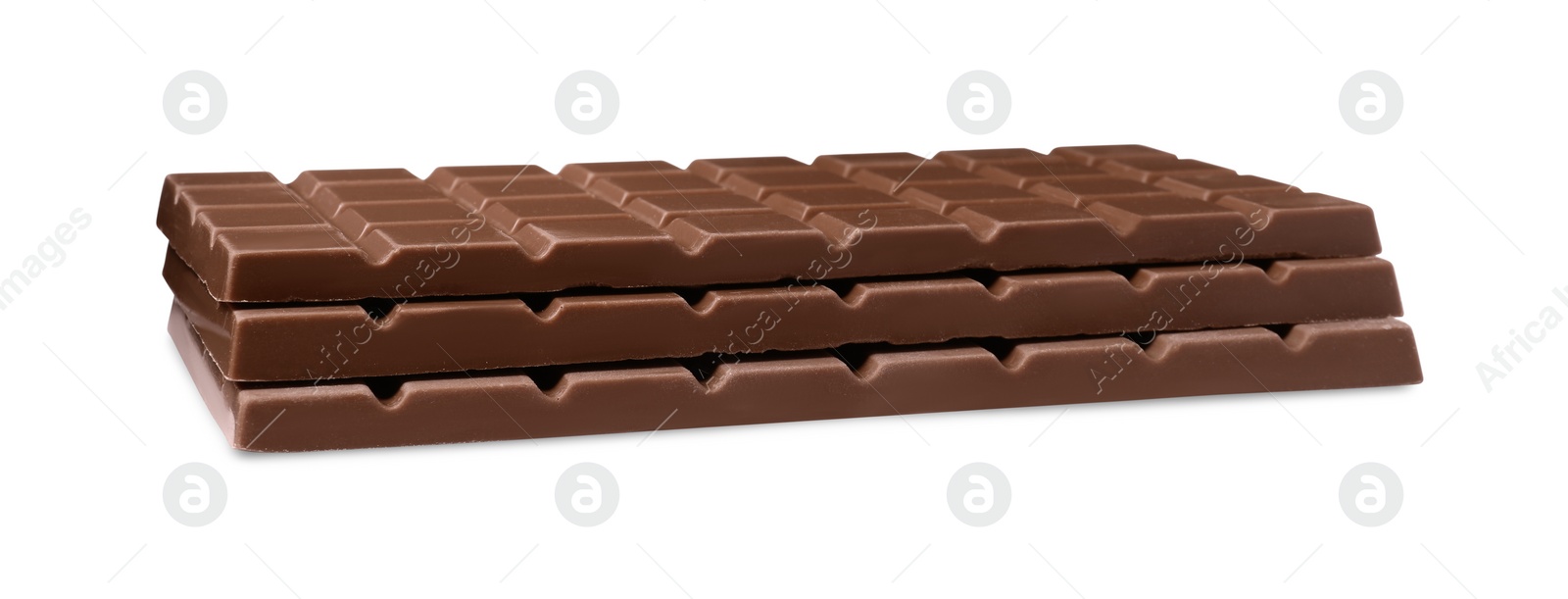 Photo of Delicious milk chocolate bars isolated on white