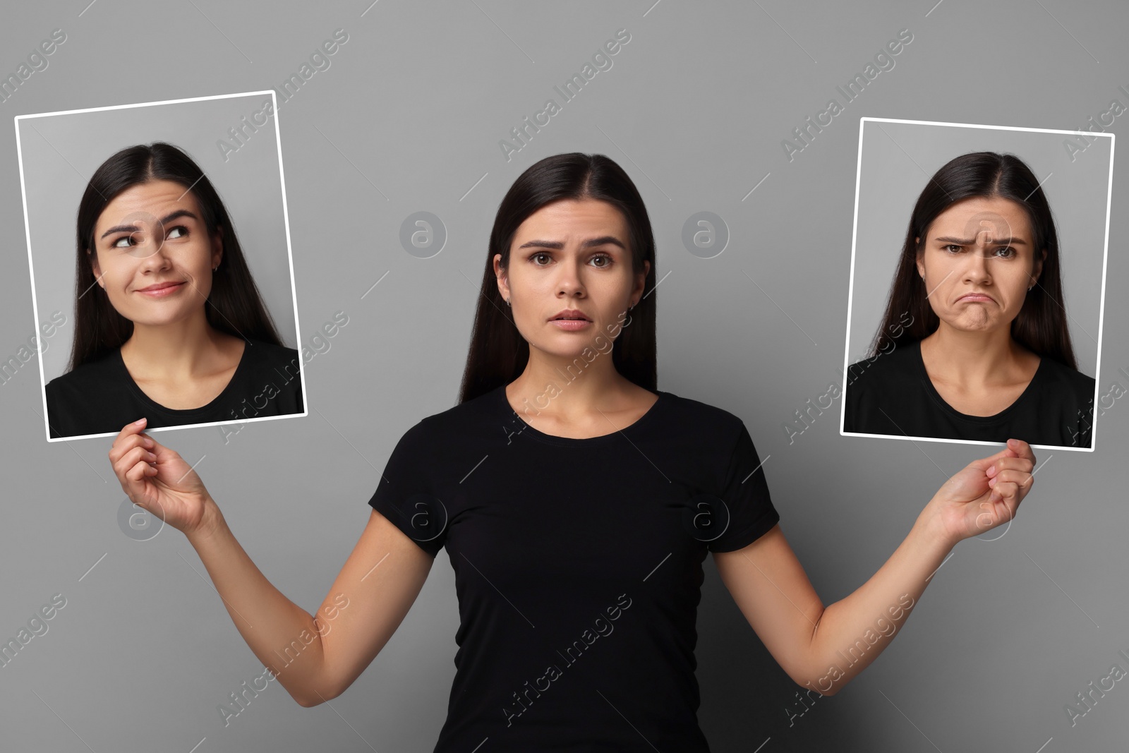 Image of Woman holding her photo portraits showing different emotions on grey background. Balanced personality