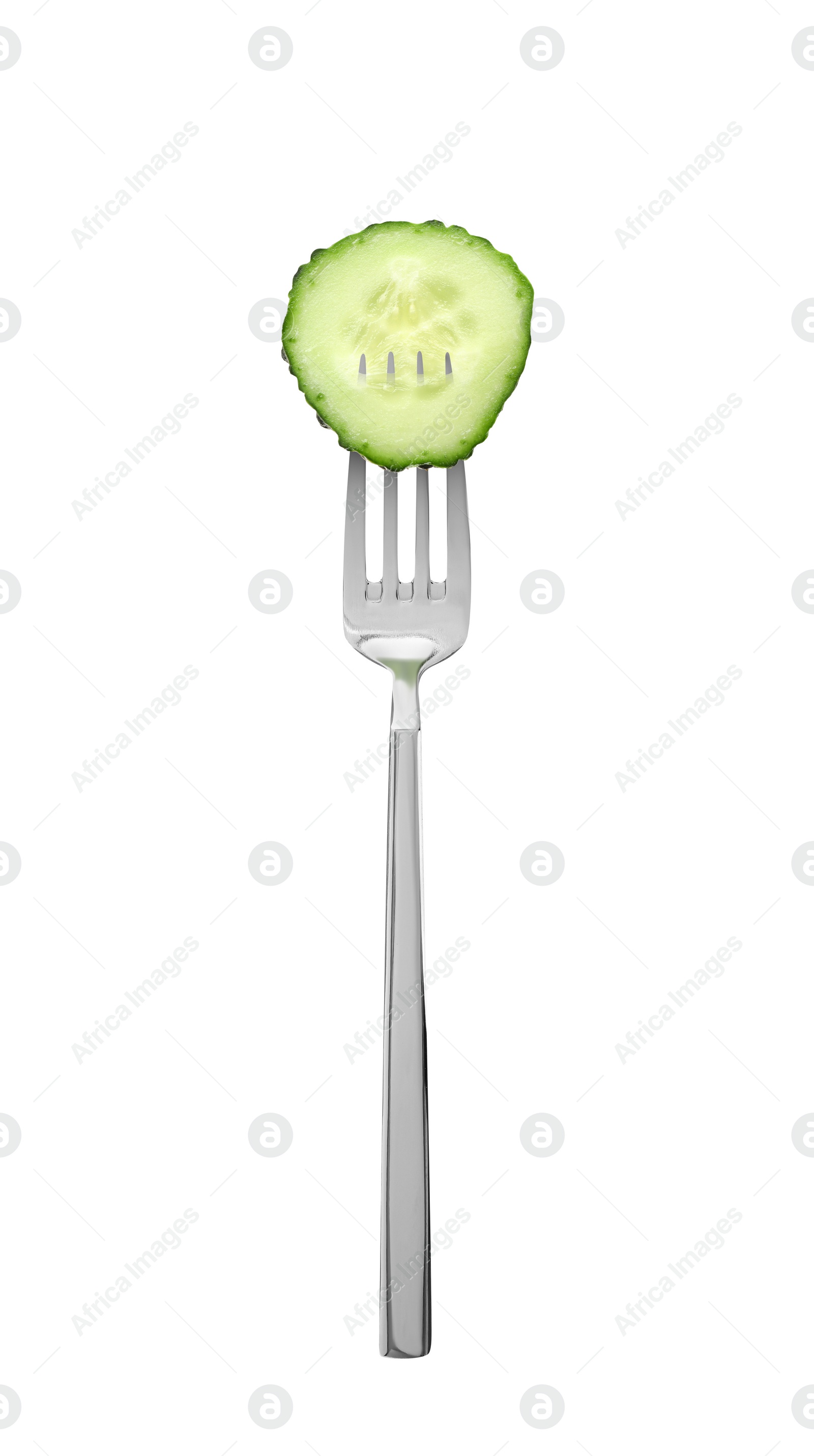 Image of Fork with piece of cucumber isolated on white