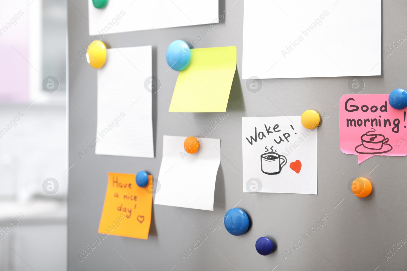 Photo of Many notes and empty sheets with magnets on refrigerator door in kitchen. Space for text