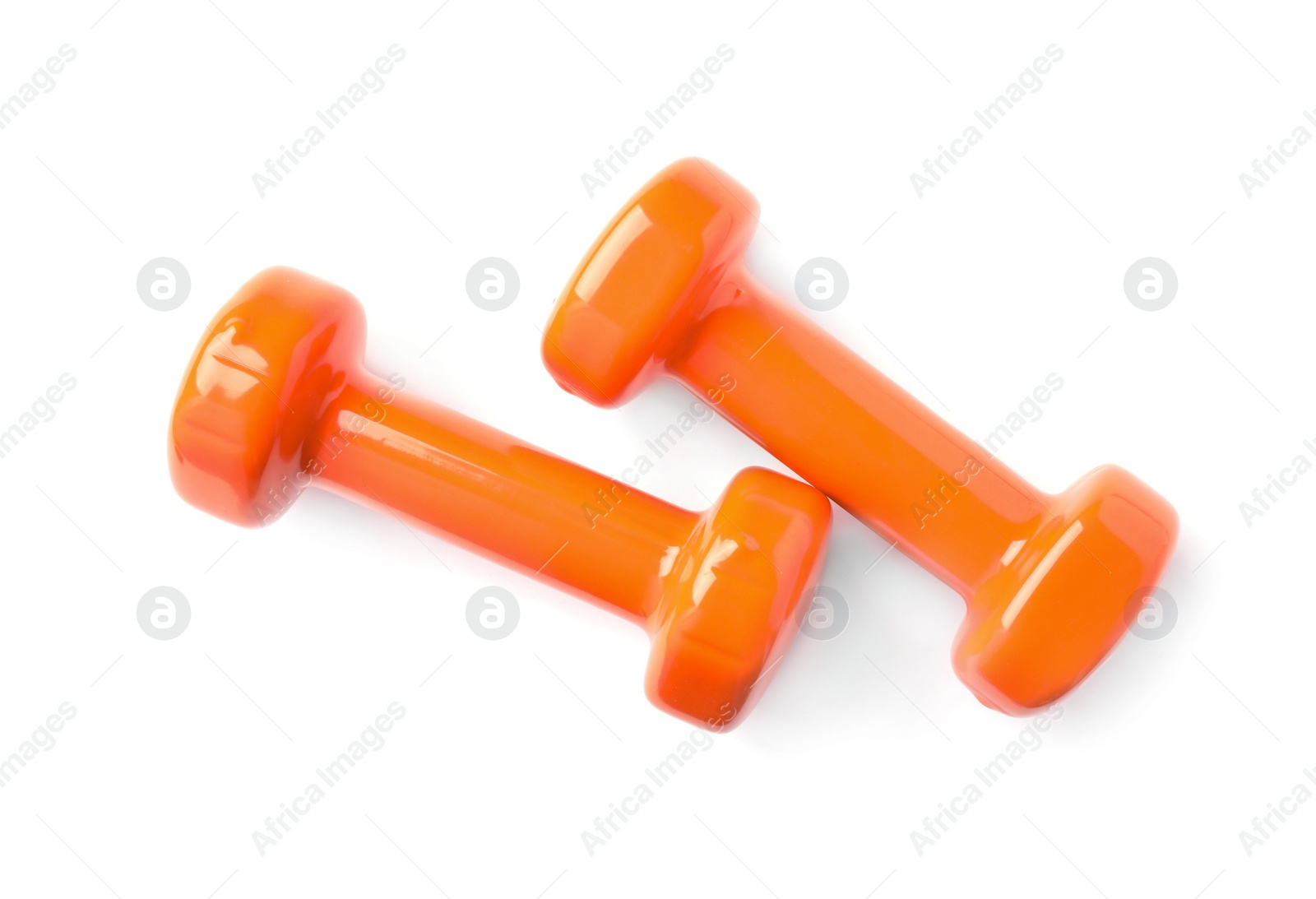 Photo of Color dumbbells on white background. Home fitness, top view