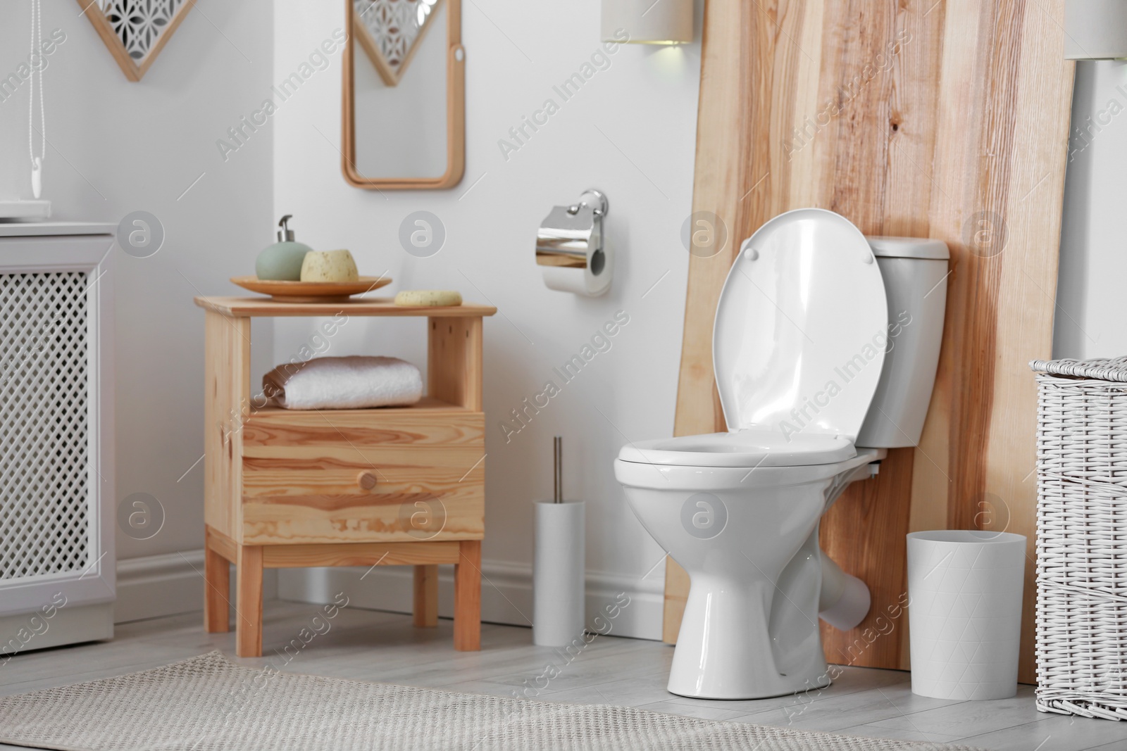 Photo of Toilet bowl in modern bathroom interior