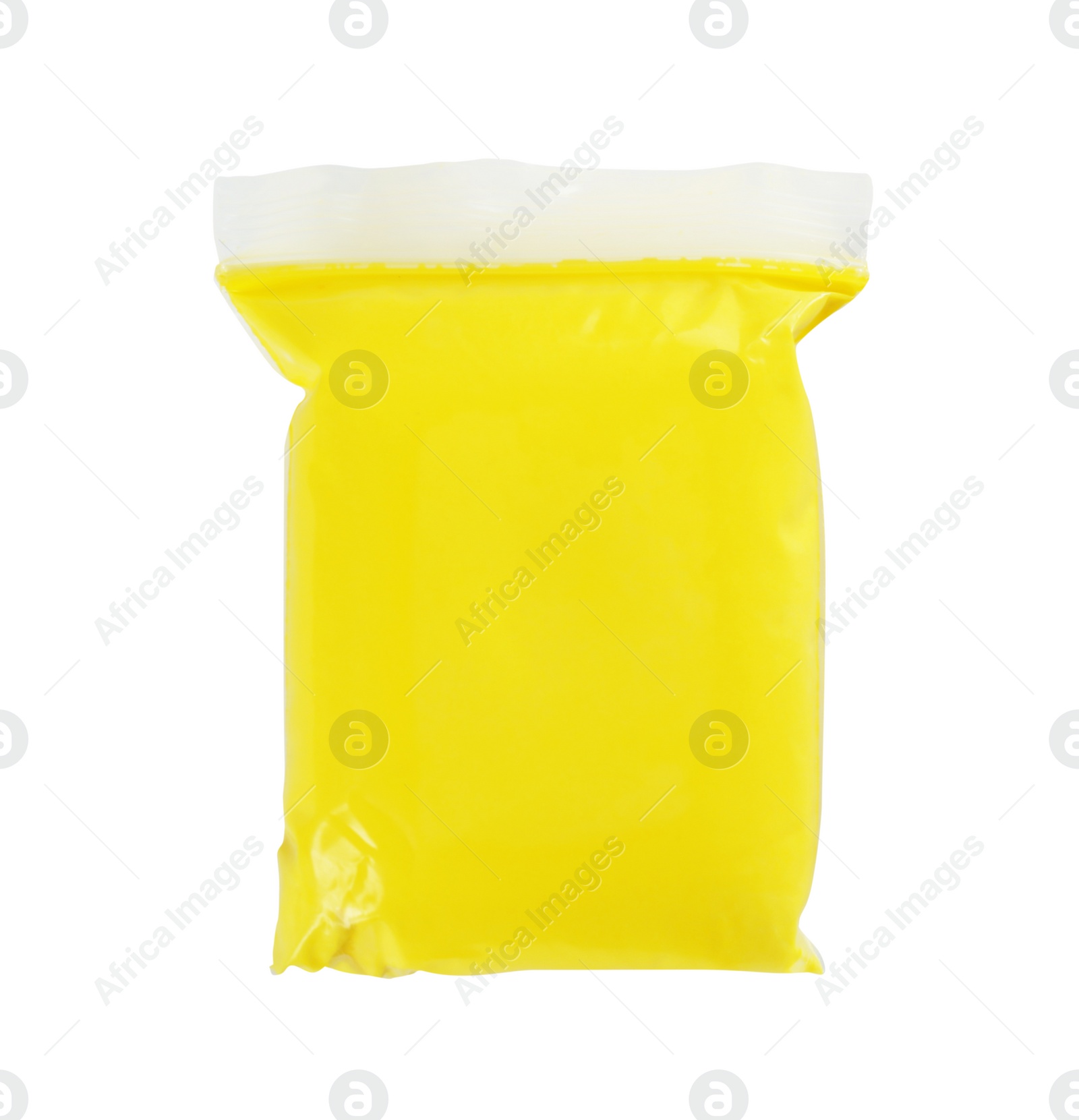 Photo of Package of yellow play dough on white background, top view