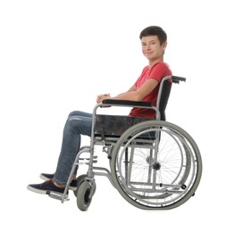 Teen boy in wheelchair on white background