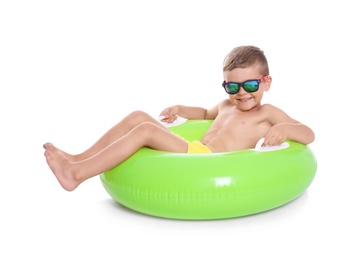 Photo of Cute little boy with inflatable ring on white background