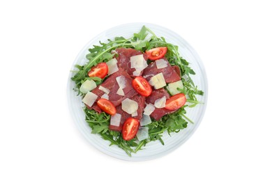 Photo of Delicious bresaola salad with parmesan cheese isolated on white, top view