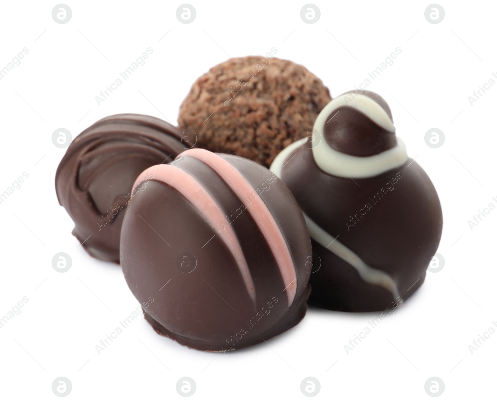 Photo of Many different delicious chocolate truffles on white background