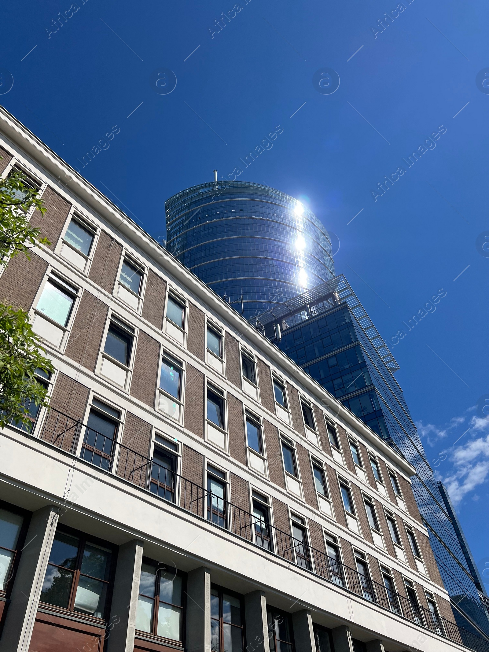 Photo of Beautiful view of skyscraper against blue sky