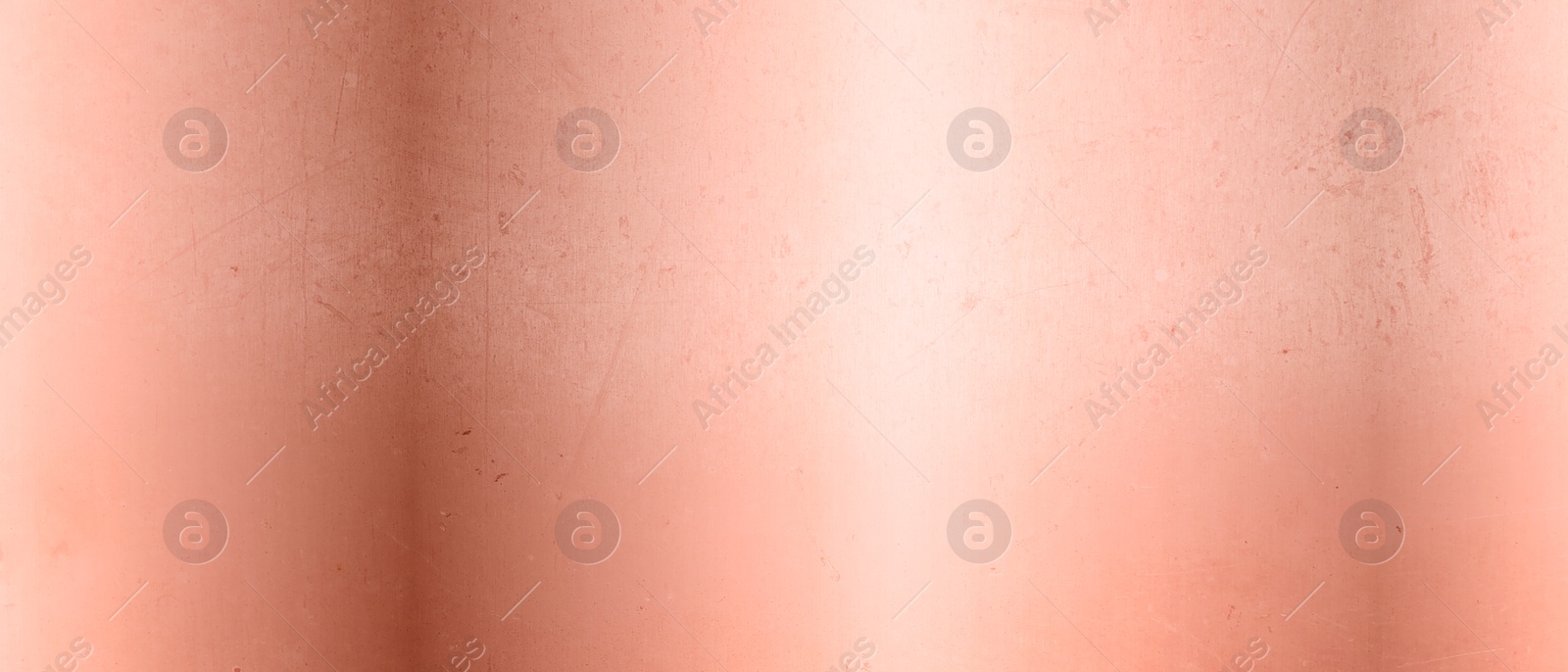 Image of Rose gold surface as background, closeup view