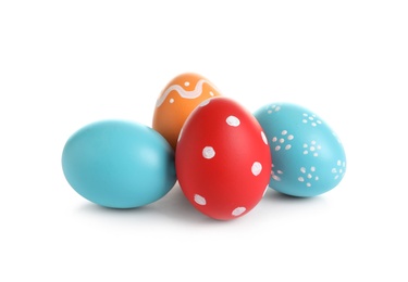 Photo of Colorful painted Easter eggs on white background