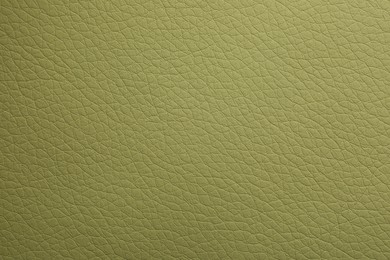 Photo of Texture of green leather as background, closeup