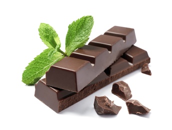 Pieces of dark chocolate with mint on white background