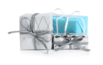 Photo of Heap of beautiful gift boxes on white background