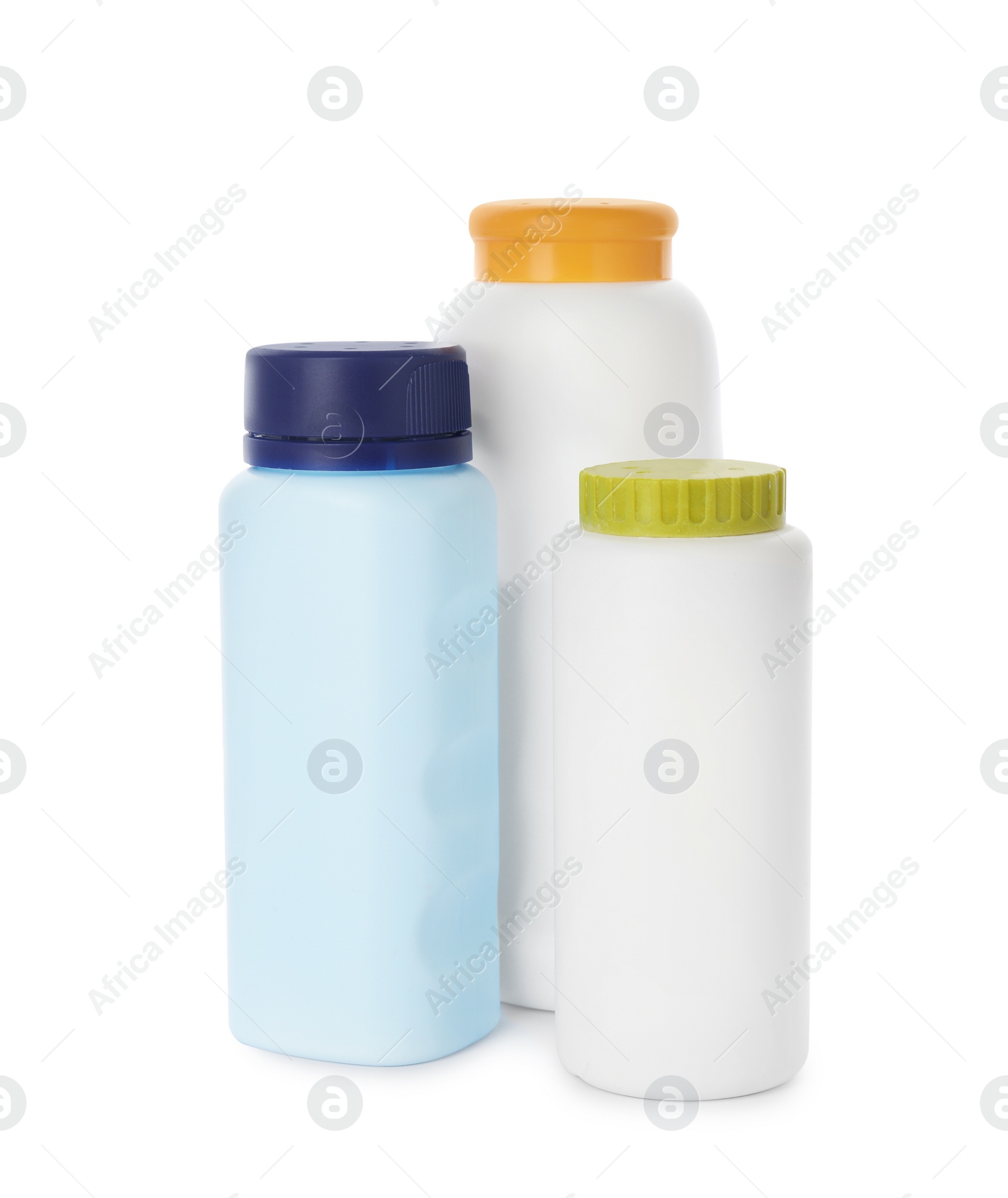 Photo of Bottles of dusting powder on white background, space for design. Baby cosmetic product