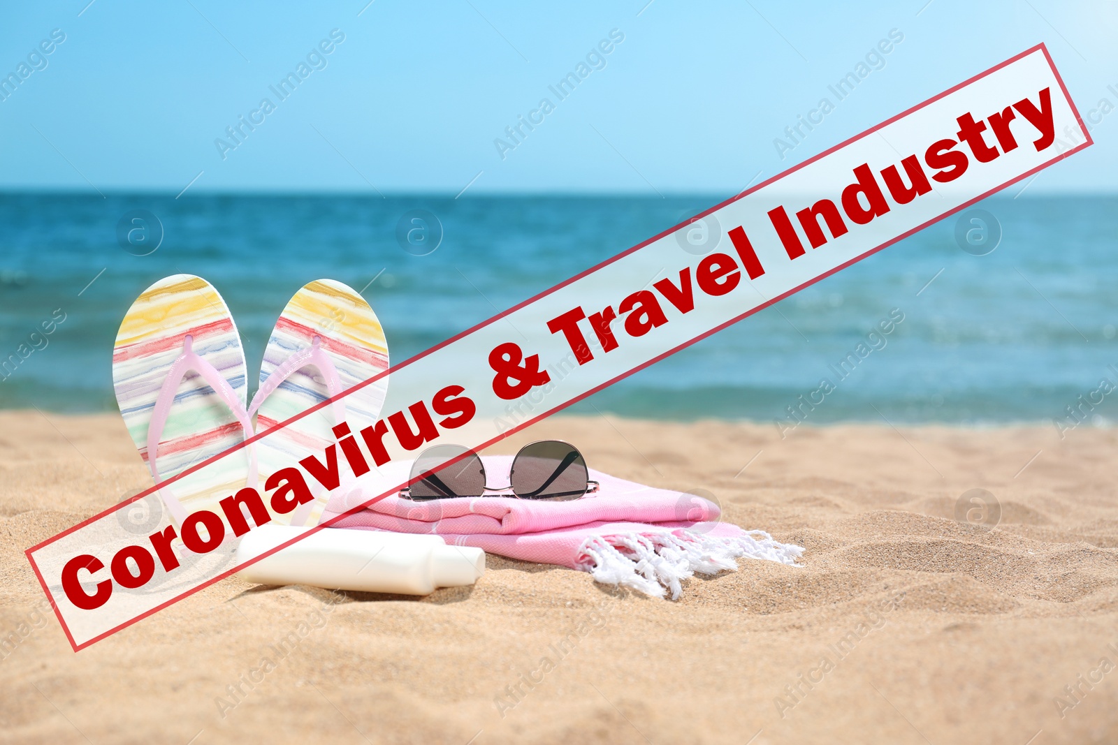 Image of Vacation cancellation concept. Different beach objects on sand near sea