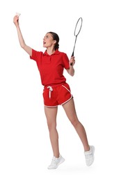 Young woman playing badminton with racket on white background