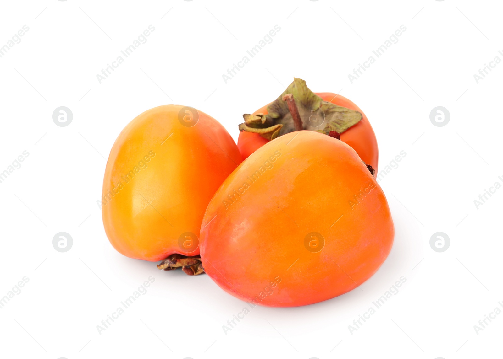 Photo of Delicious ripe juicy persimmons on white background