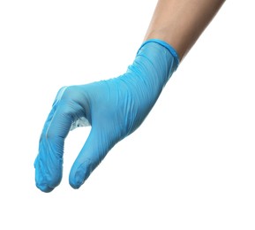 Doctor wearing light blue medical glove holding something on white background, closeup