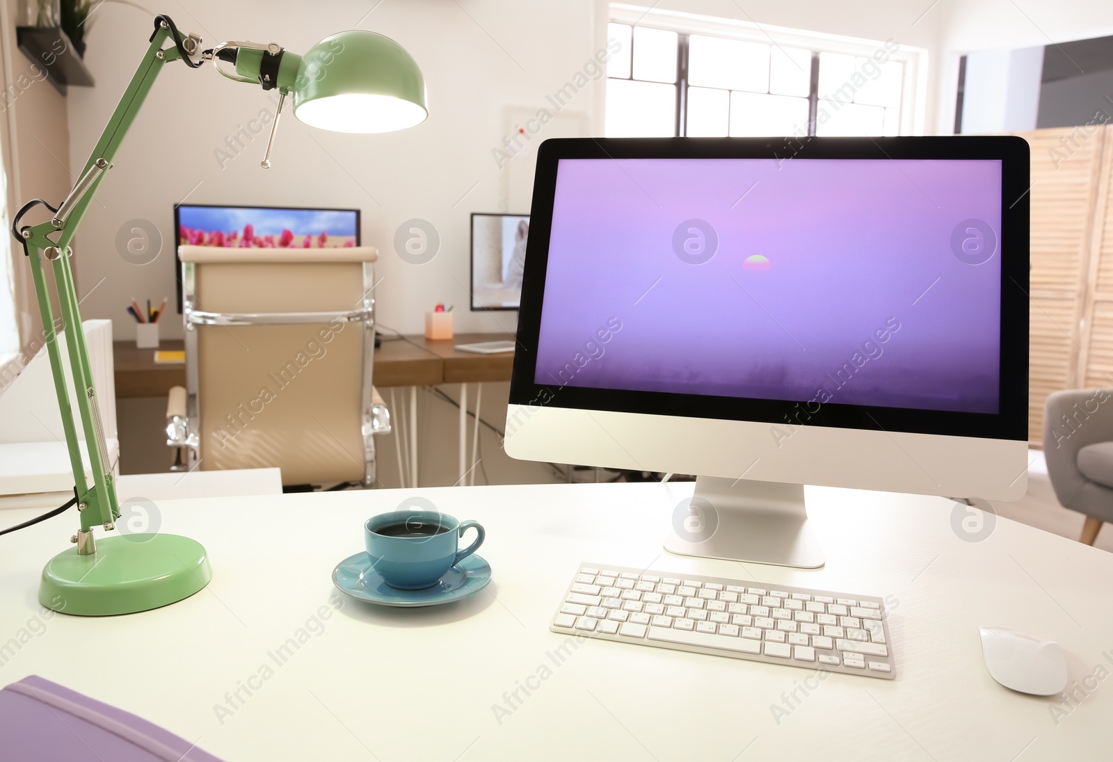 Photo of Stylish workplace with computer on table