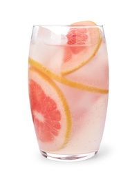 Glass of grapefruit refreshing drink with ice cubes on white background