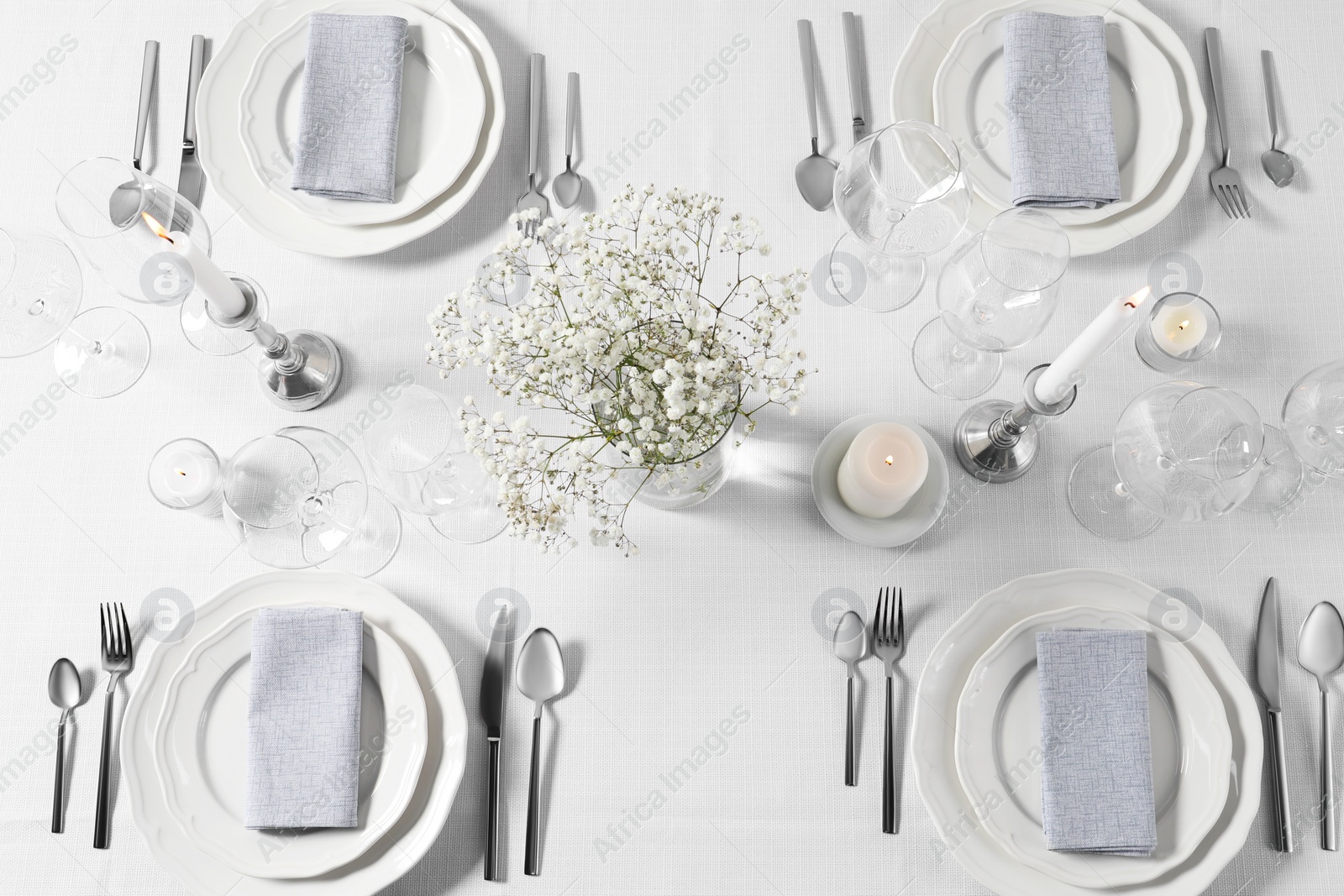 Photo of Beautiful table setting with floral decor, flat lay