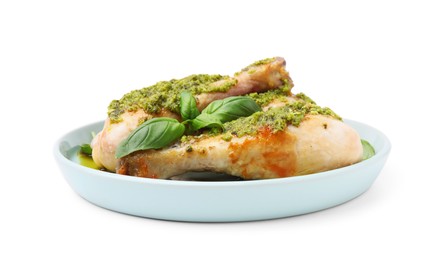 Photo of Delicious fried chicken drumsticks with pesto sauce and basil isolated on white