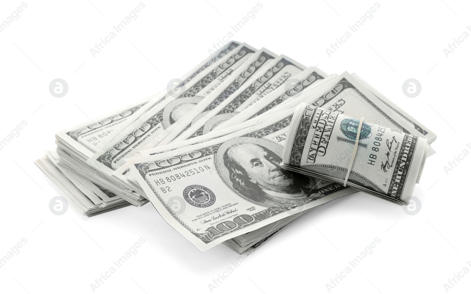 Photo of Many dollar banknotes on white background. American national currency