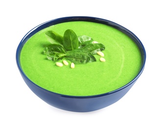 Bowl of healthy green soup with fresh spinach on white background