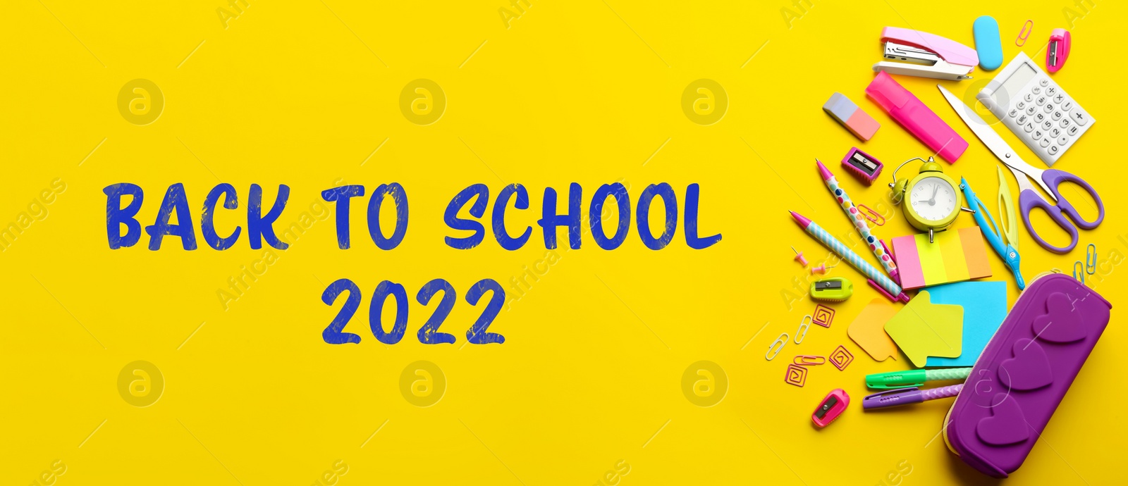 Image of Back to school 2022. Flat lay composition with different stationery on yellow background, banner design