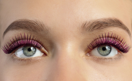 Image of Young woman with color eyelashes and beautiful makeup, closeup