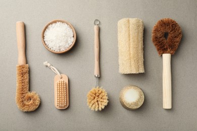 Photo of Flat lay composition with eco friendly products on light grey background. Conscious consumption