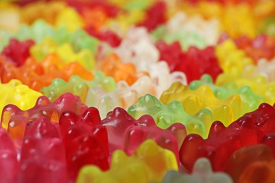 Many delicious colorful jelly bears as background, closeup