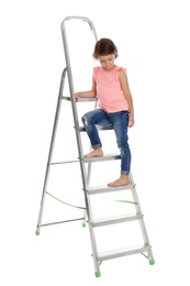 Photo of Little girl sitting on ladder on white background. Danger at home