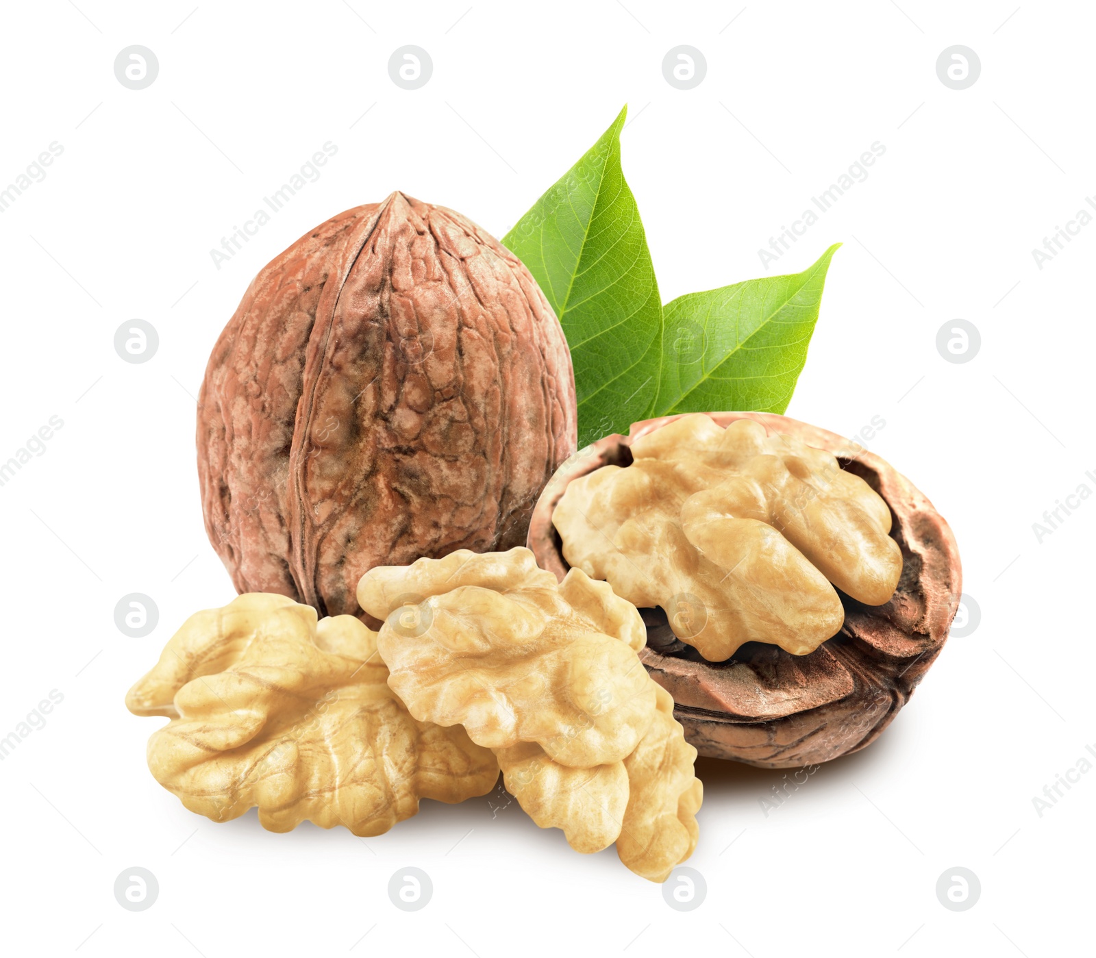 Image of Tasty walnuts and green leaves on white background