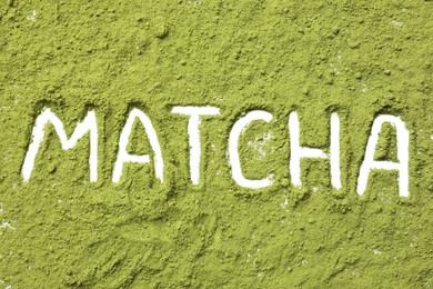 Photo of Word Matcha made of green powder isolated on white, top view