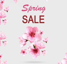 Spring sale flyer design with text and beautiful pink flowers on light grey background