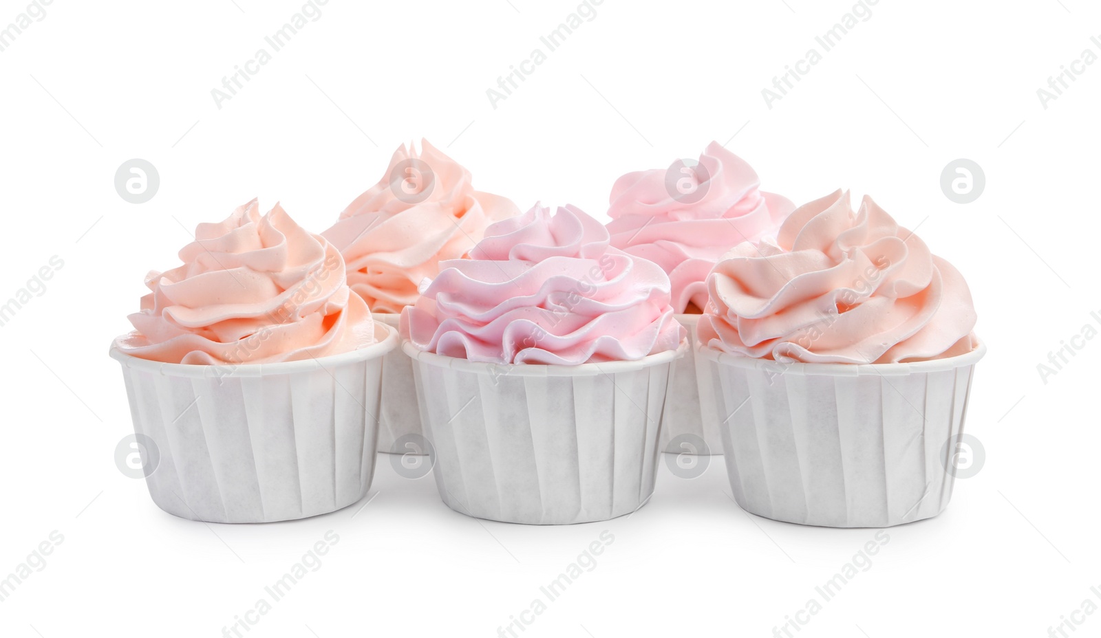 Photo of Tasty cupcakes with cream isolated on white