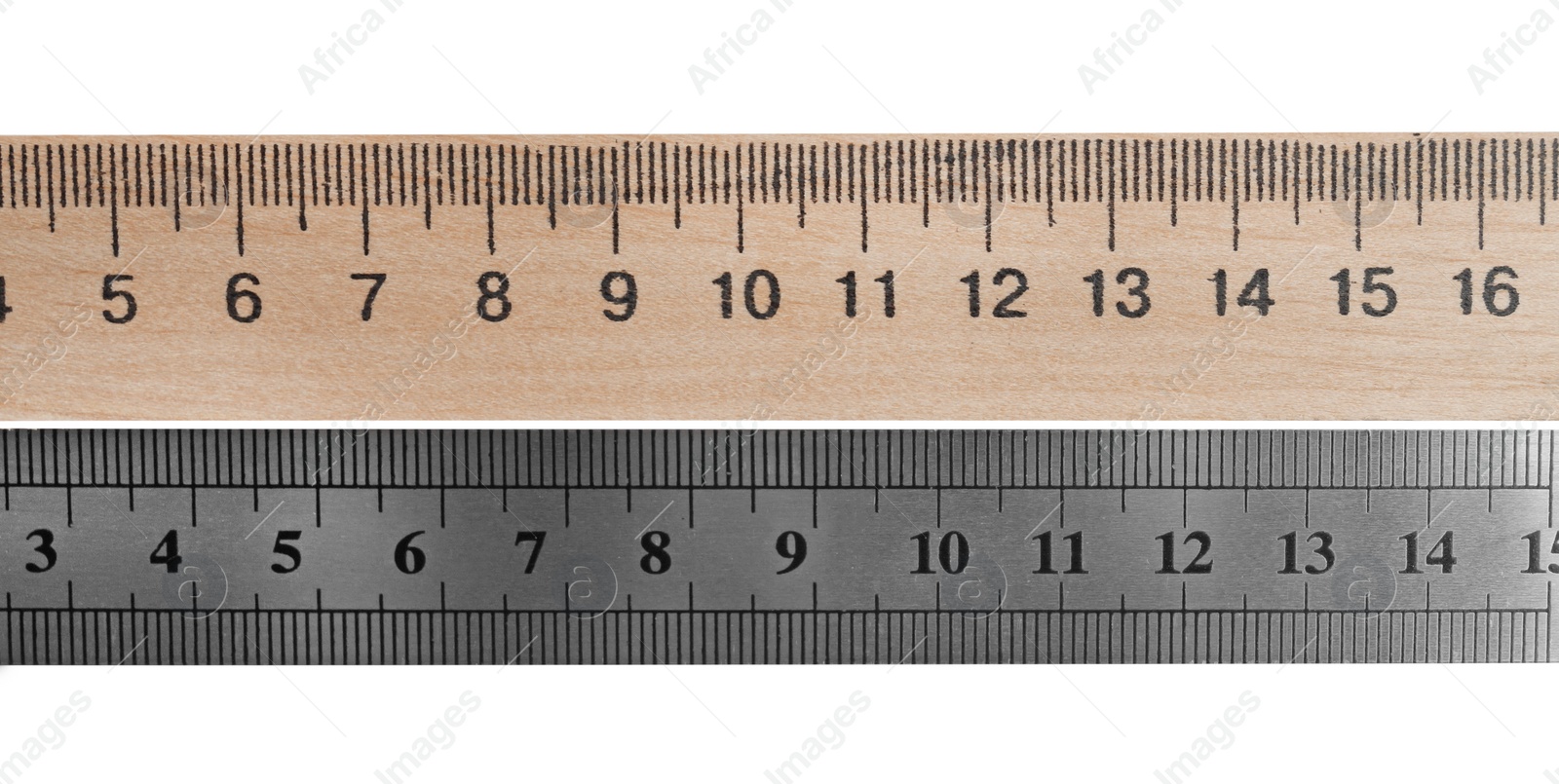 Photo of Rulers with measuring length markings in centimeters isolated on white, top view