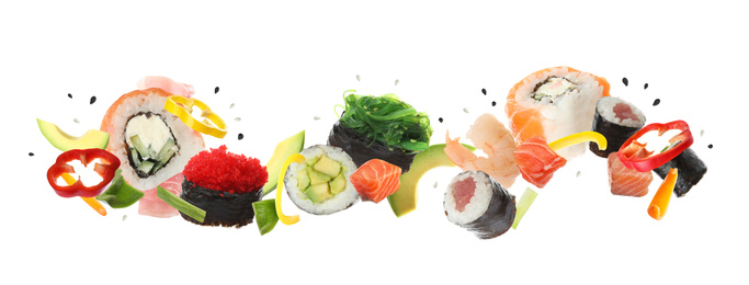 Image of Different sushi rolls and ingredients on white background