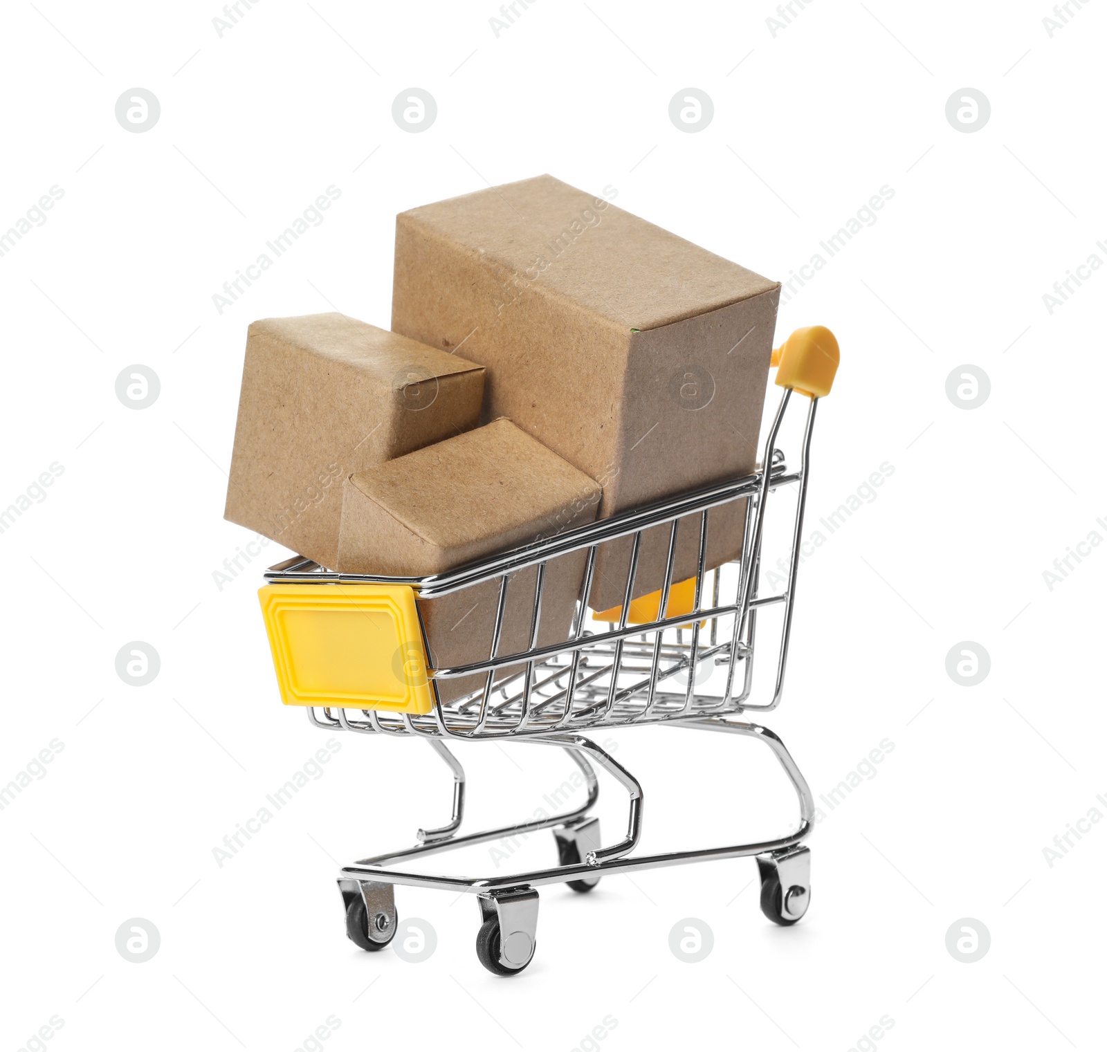 Photo of Shopping cart with boxes isolated on white. Logistics and wholesale concept