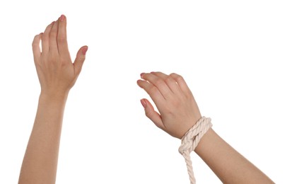 Photo of Freedom concept. Woman with rope on her hand against white background, closeup