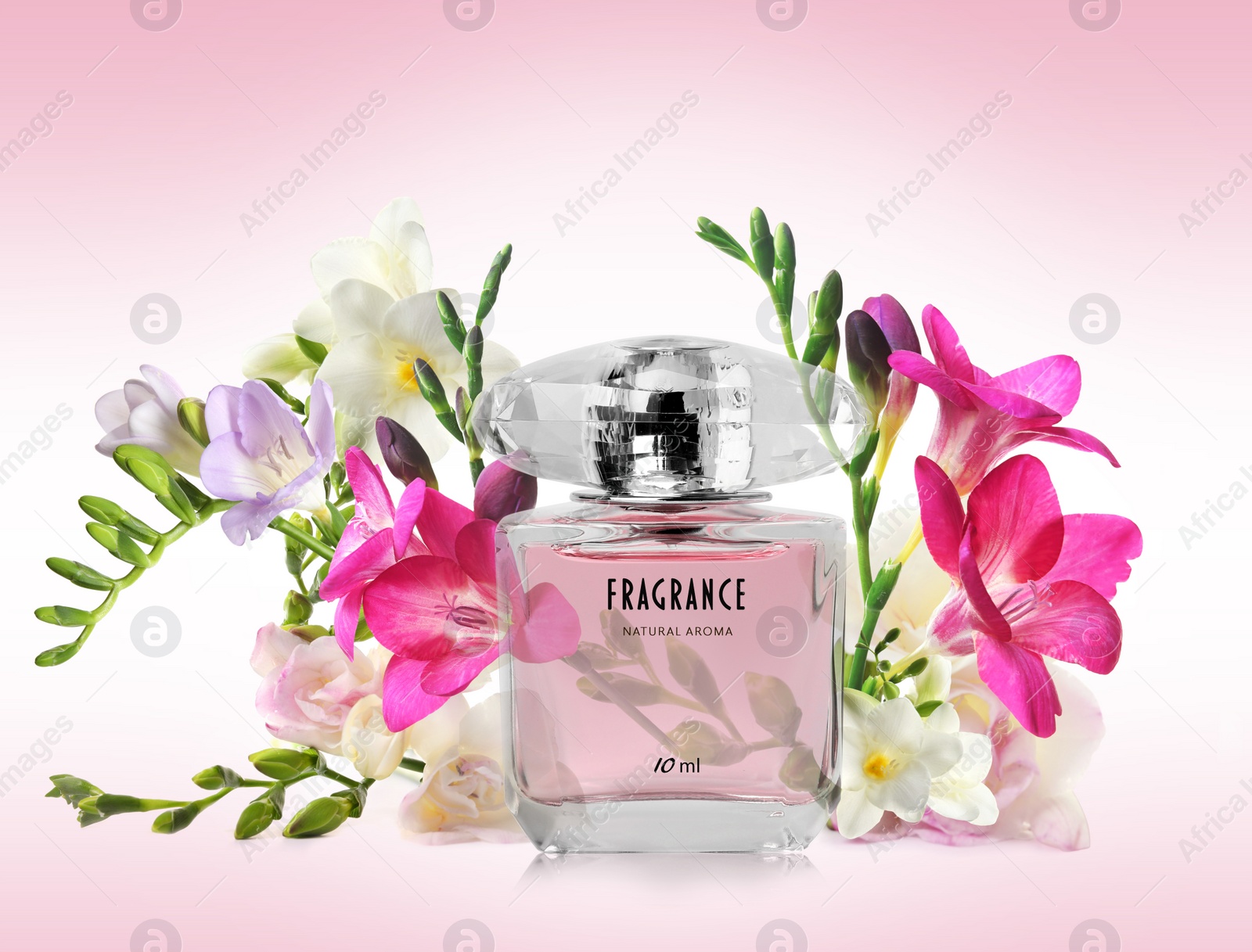 Image of Bottle of luxury perfume and beautiful flowers on color background