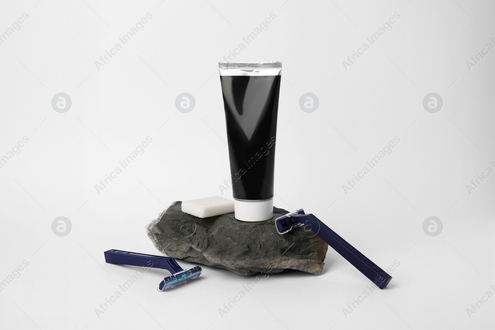 Photo of Different men's shaving accessories on light background