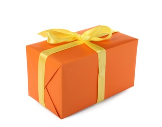 Orange gift box with yellow bow isolated on white