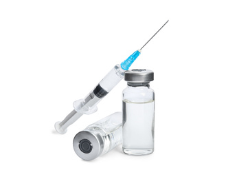 Vials and syringe on white background. Vaccination and immunization