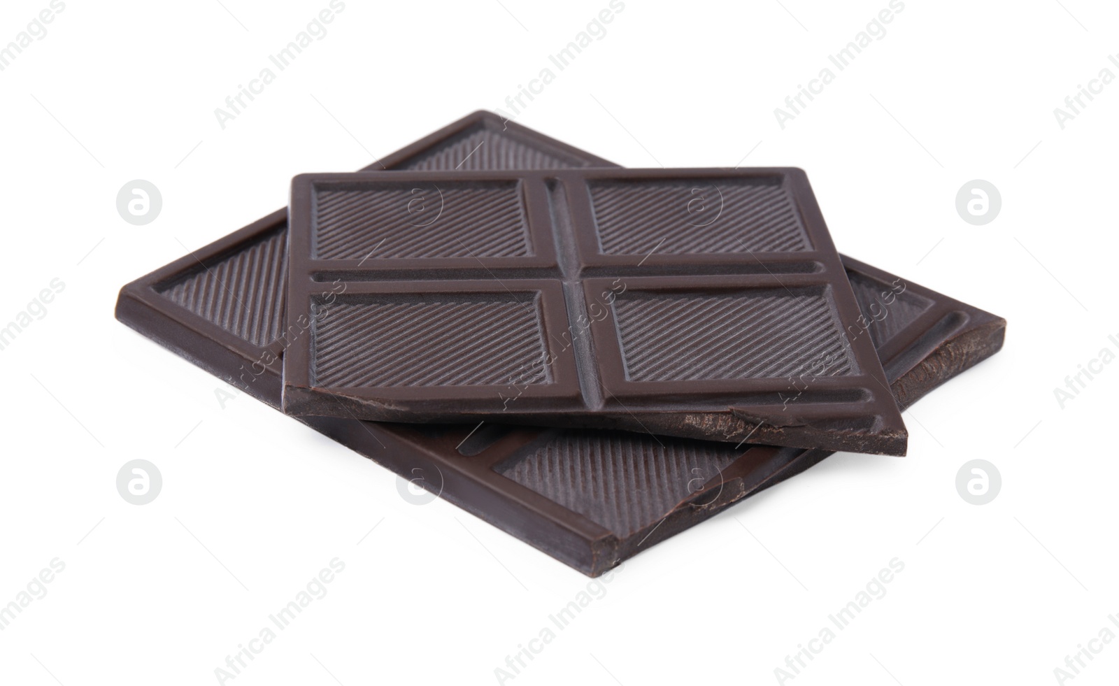Photo of Pieces of tasty dark chocolate bar on isolated white